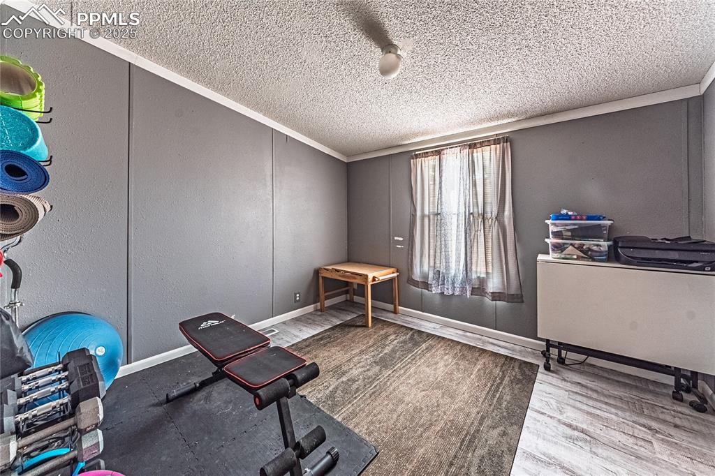 36 Valley Circle Guffey, CO 80820 - Photo 17 of 40 a bedroom with furniture and a window