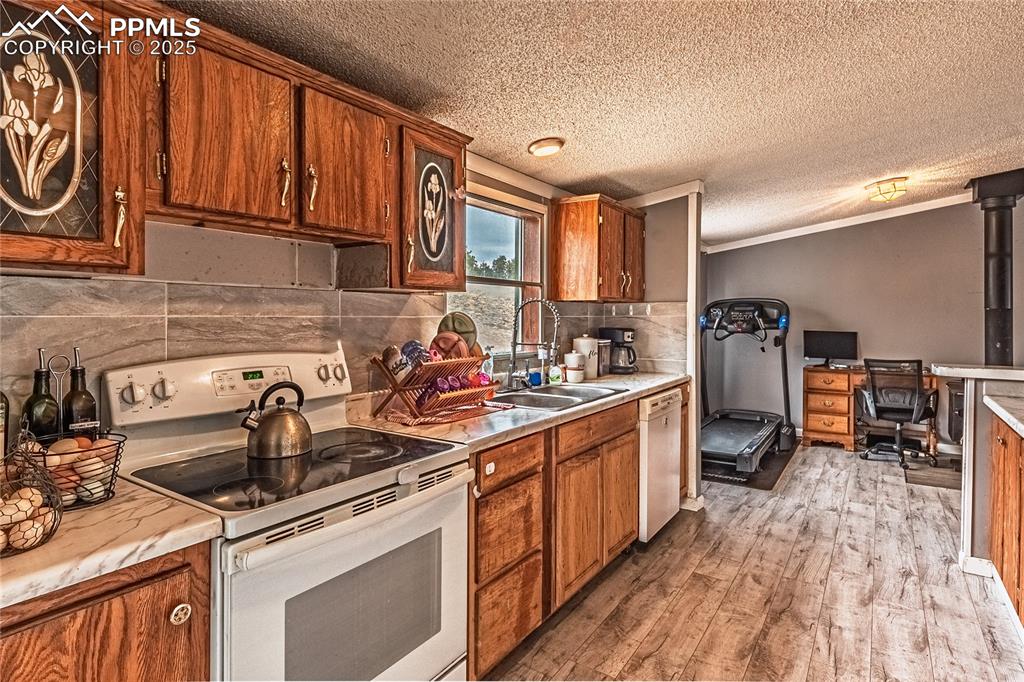 36 Valley Circle Guffey, CO 80820 - Photo 22 of 40 a kitchen that has a sink and a stove