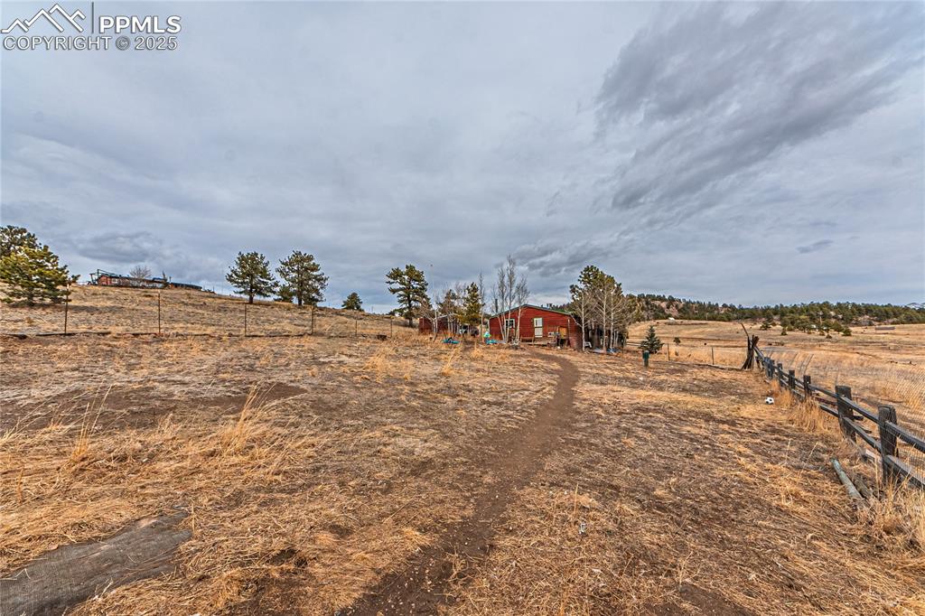 36 Valley Circle Guffey, CO 80820 - Photo 36 of 40 a group of people sitting on top of a lake