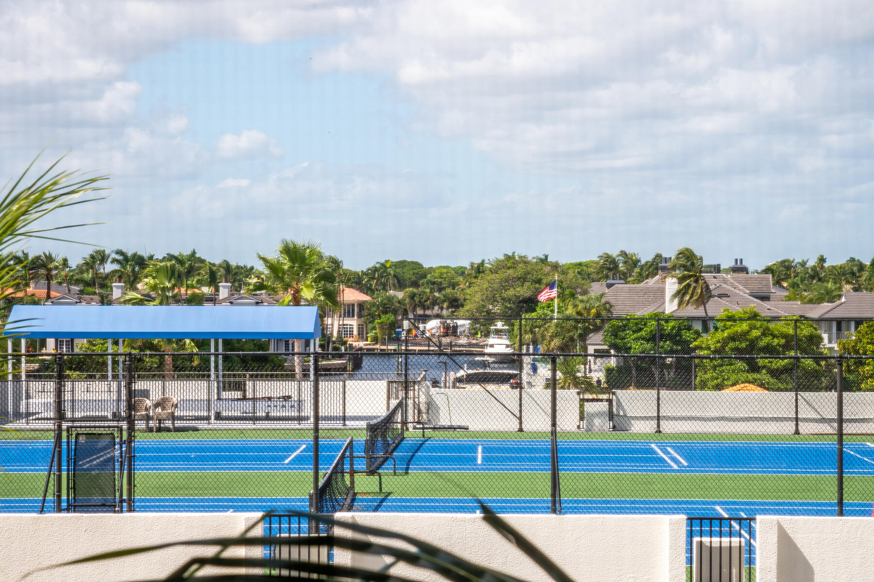 a view of a swimming pool with an outdoor seating