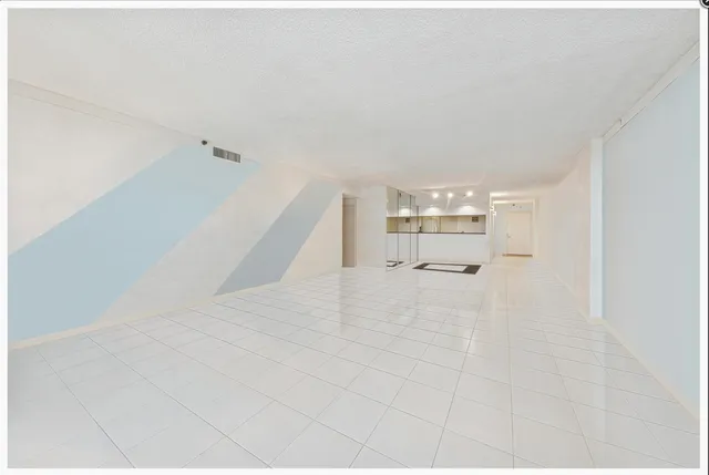 a view of a livingroom with furniture