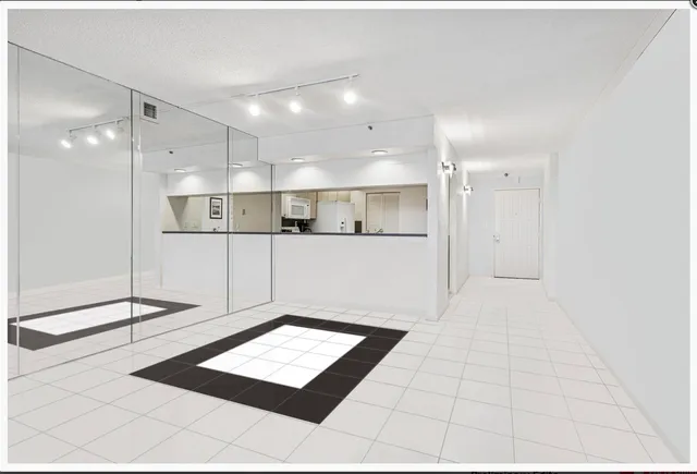 a view of a hallway with a couch