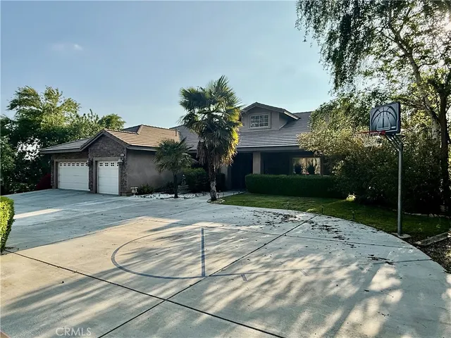 a front view of a house with yard