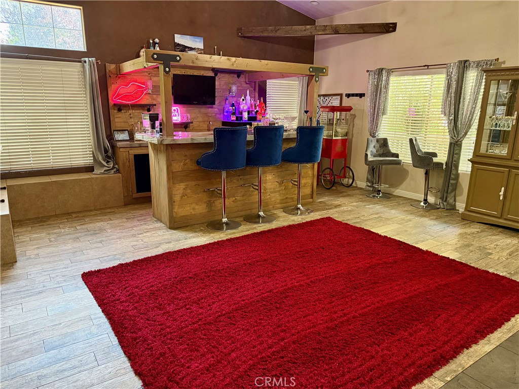 9869 Kehl Canyon Road Cherry Valley, CA 92223 - Photo 12 of 27 a living room with furniture pool table and flat screen tv