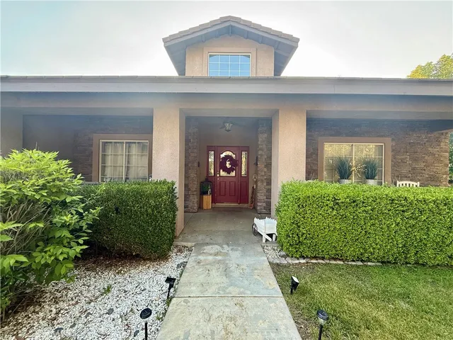 a view of entryway with a brick wall