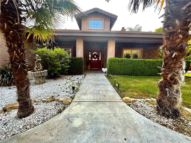 a bathroom with a double vanity sink and mirror with shower