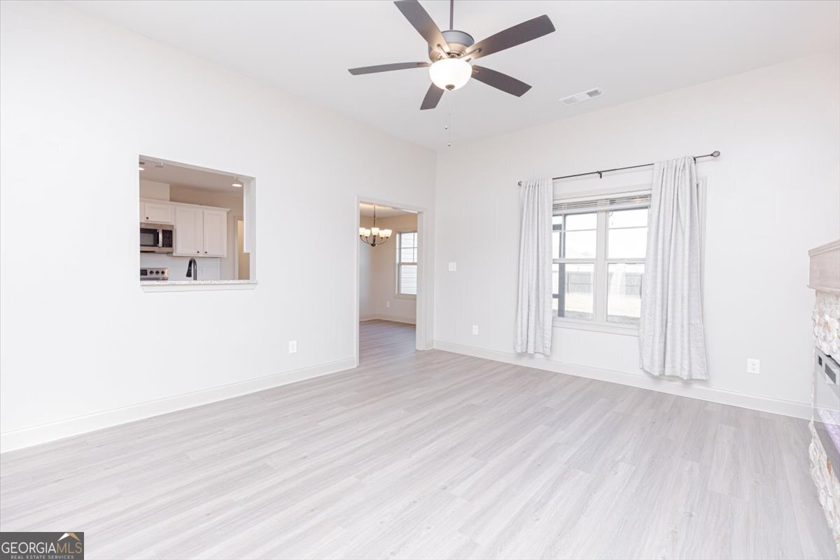 104 Gunner Lane Perry, GA 31069 - Photo 11 of 48 a view of an empty room with a window