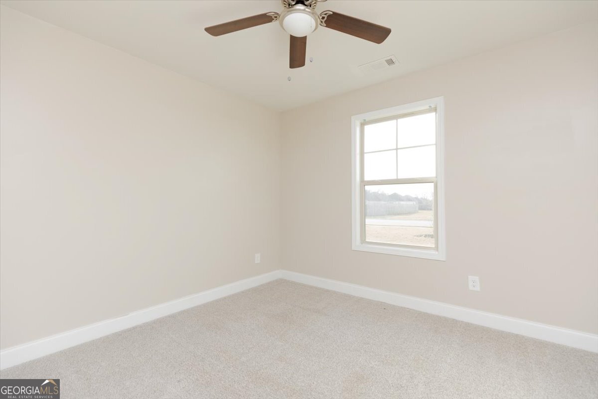 104 Gunner Lane Perry, GA 31069 - Photo 41 of 48 an empty room with a window