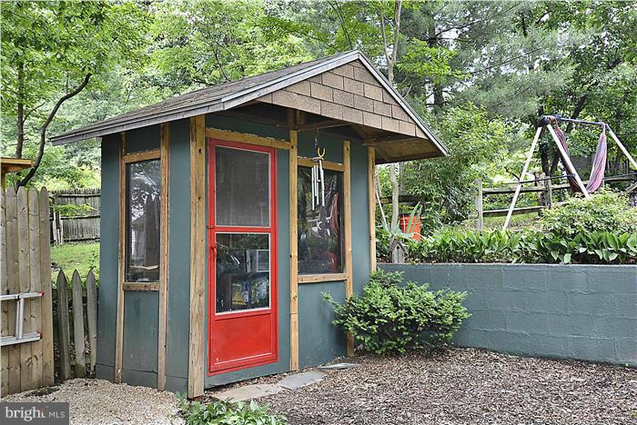 10628 South Dunmoor Drive Silver Spring, MD 20901 - Photo 23 of 30 Garden shed keeps tools & toys organized