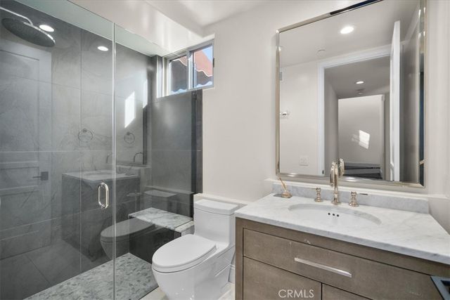 a view of a kitchen with a sink and a window