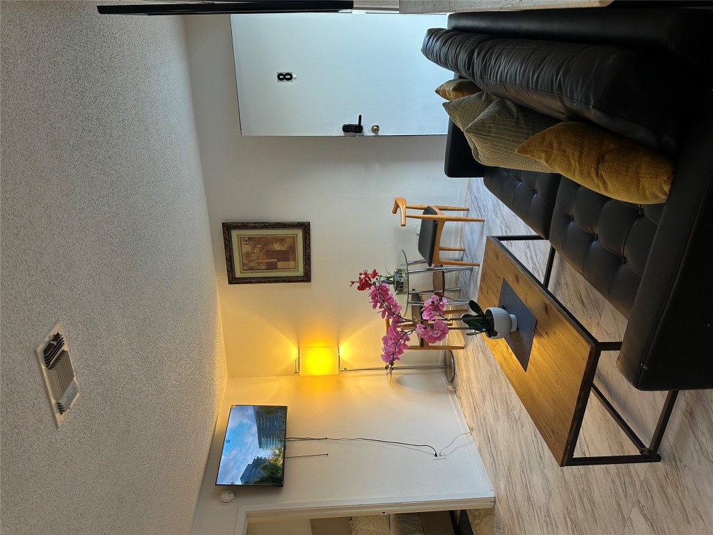 a living room with furniture and a table