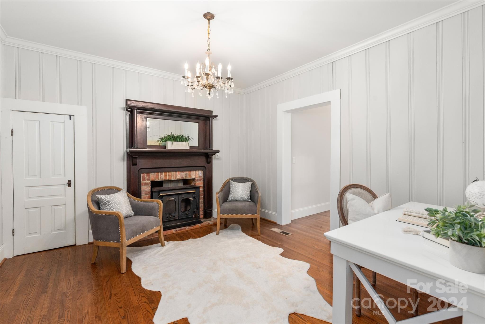 110 Park Road West Indian Trail, NC 28079 - Photo 19 of 41 a bedroom with furniture and a fireplace