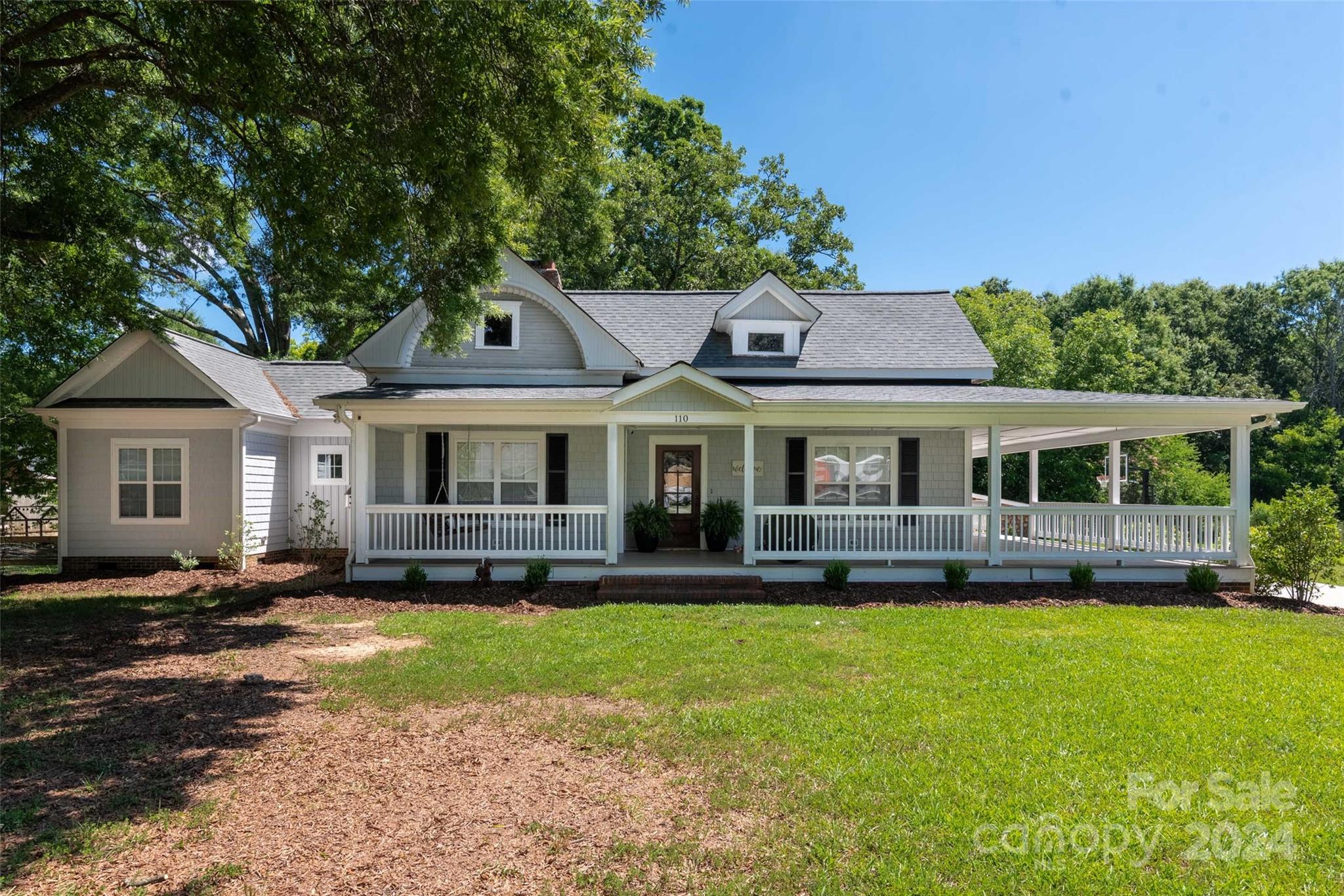 110 Park Road West Indian Trail, NC 28079 - Photo 2 of 41 a front view of a house with a yard