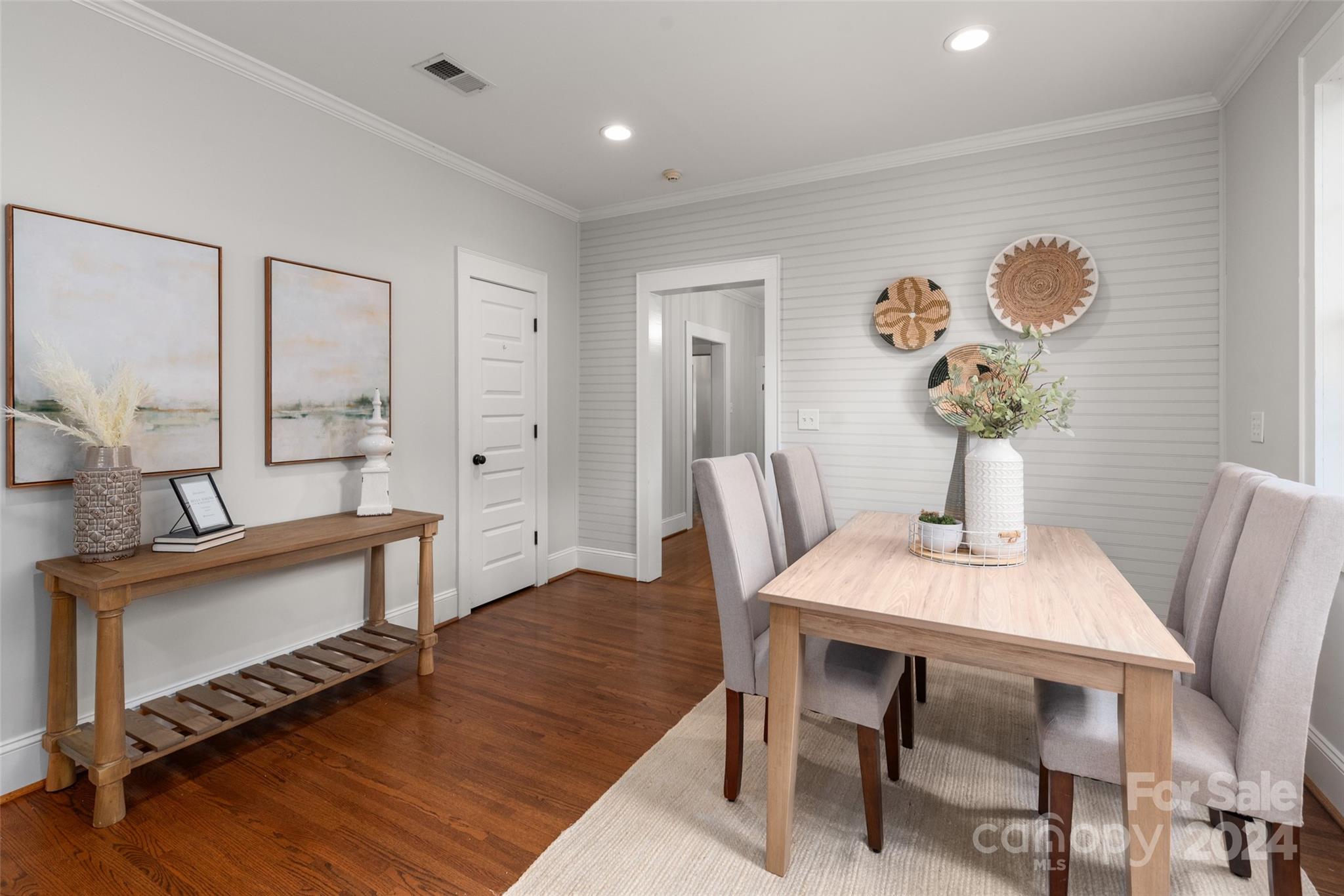110 Park Road West Indian Trail, NC 28079 - Photo 26 of 41 a view of a dining room with furniture and wooden floor