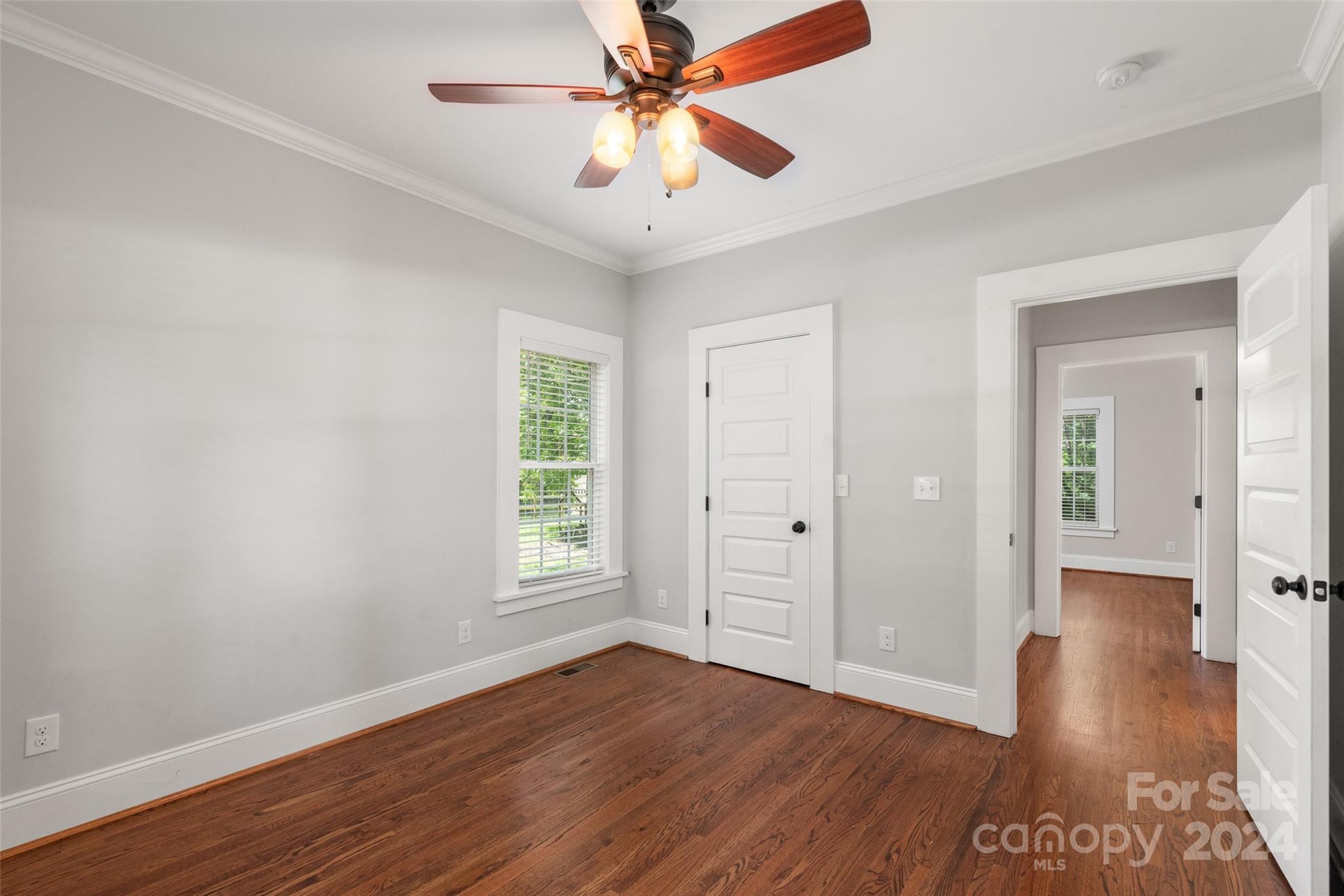 110 Park Road West Indian Trail, NC 28079 - Photo 35 of 41 wooden floor in an empty room with a window