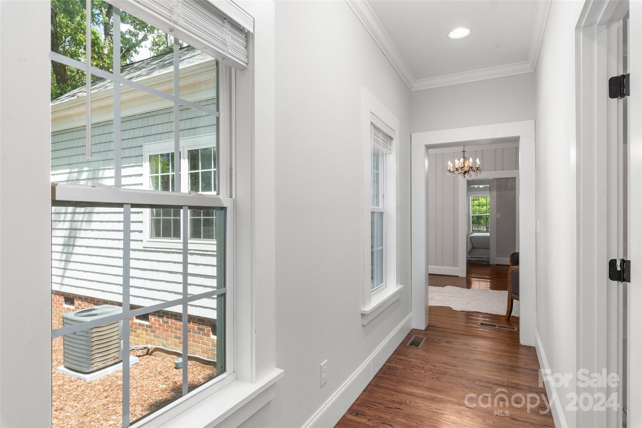 110 Park Road West Indian Trail, NC 28079 - Photo 38 of 41 a view of a hallway with wooden floor and door