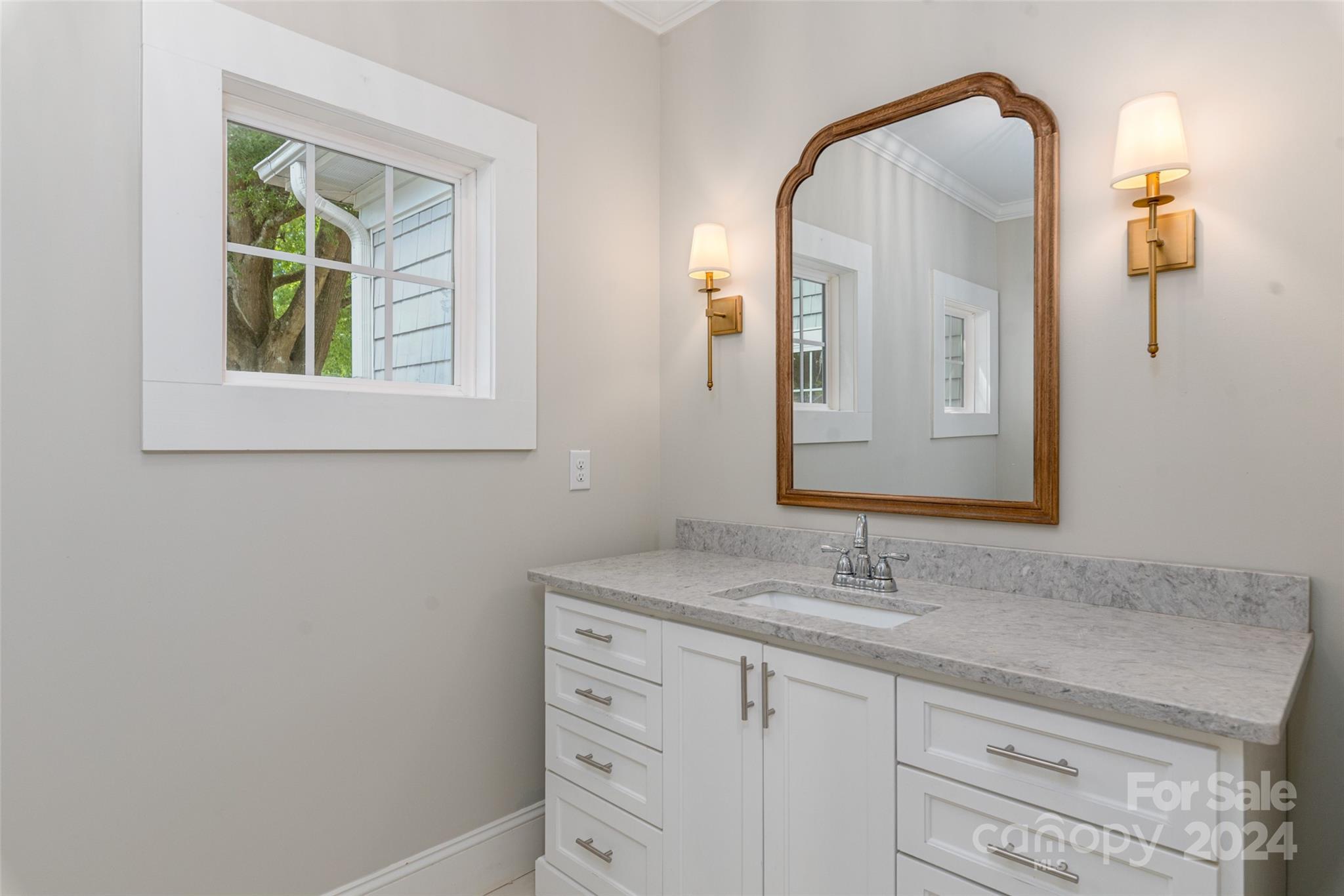 110 Park Road West Indian Trail, NC 28079 - Photo 39 of 41 a bathroom with a sink and two mirror