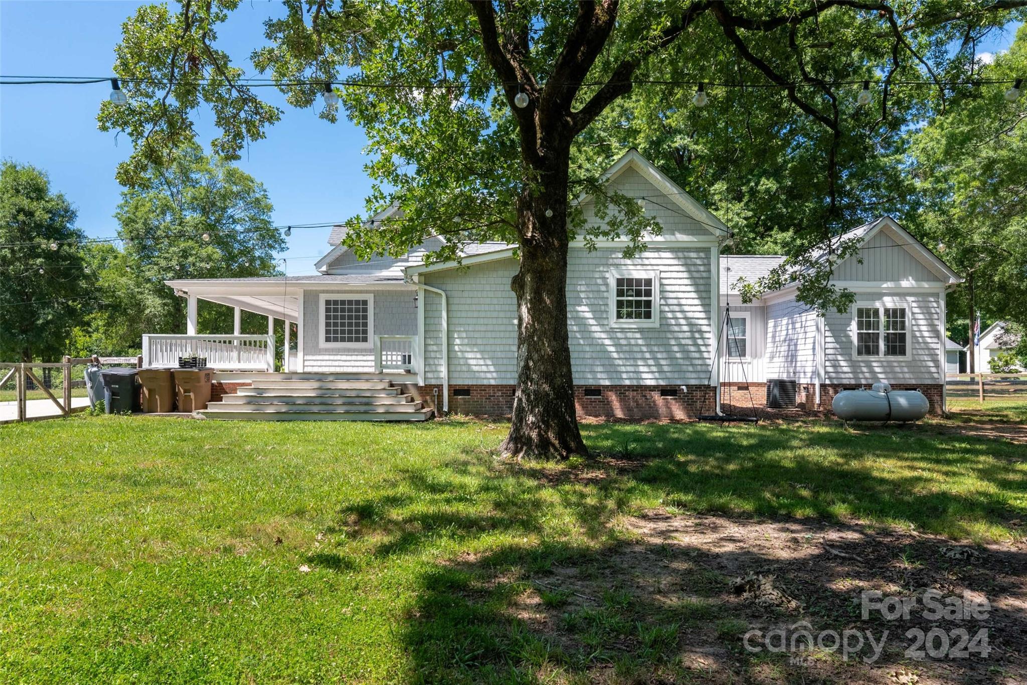 110 Park Road West Indian Trail, NC 28079 - Photo 40 of 41 a front view of a house with a garden