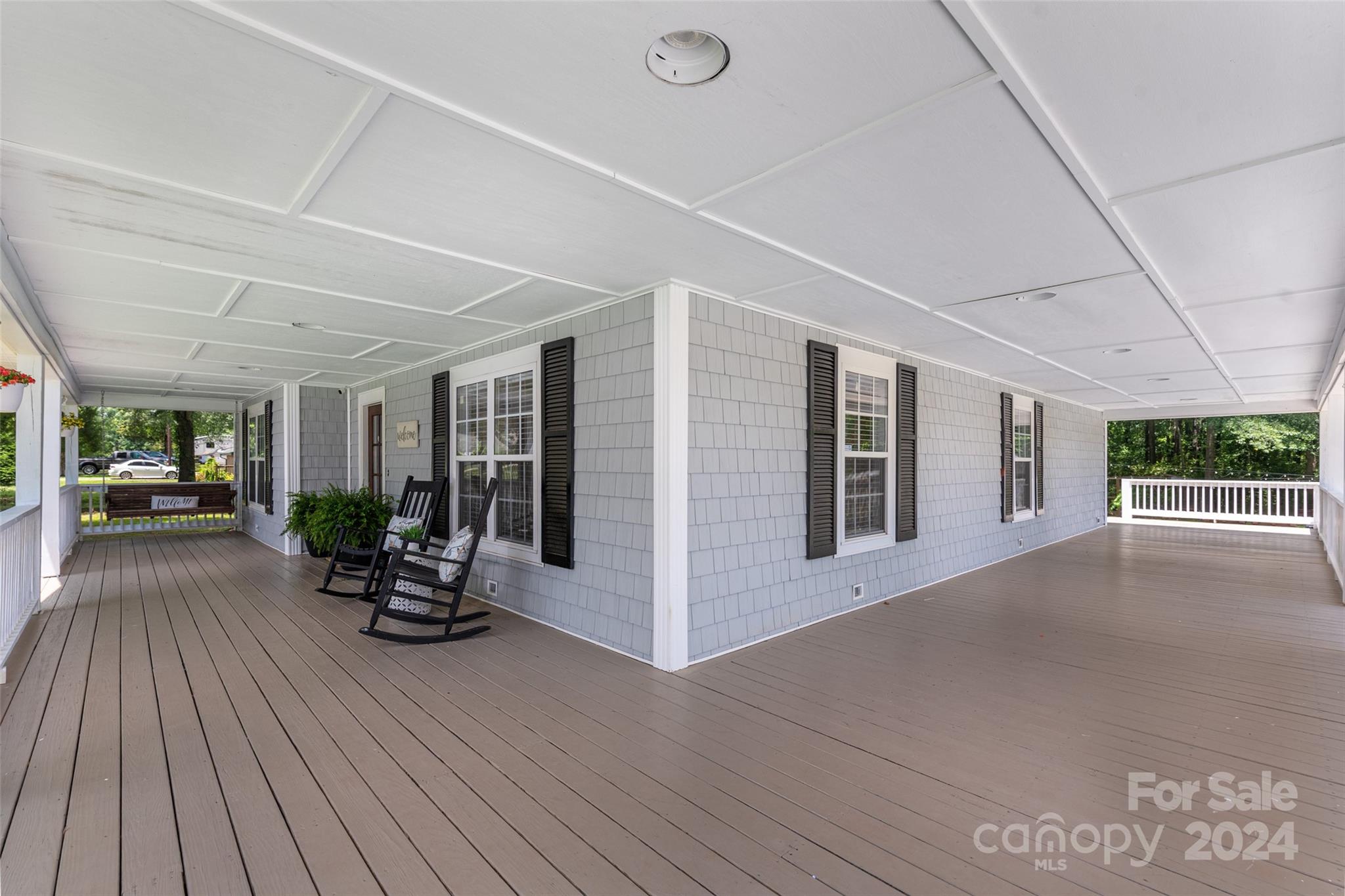 110 Park Road West Indian Trail, NC 28079 - Photo 4 of 41 a view of a living room and a balcony