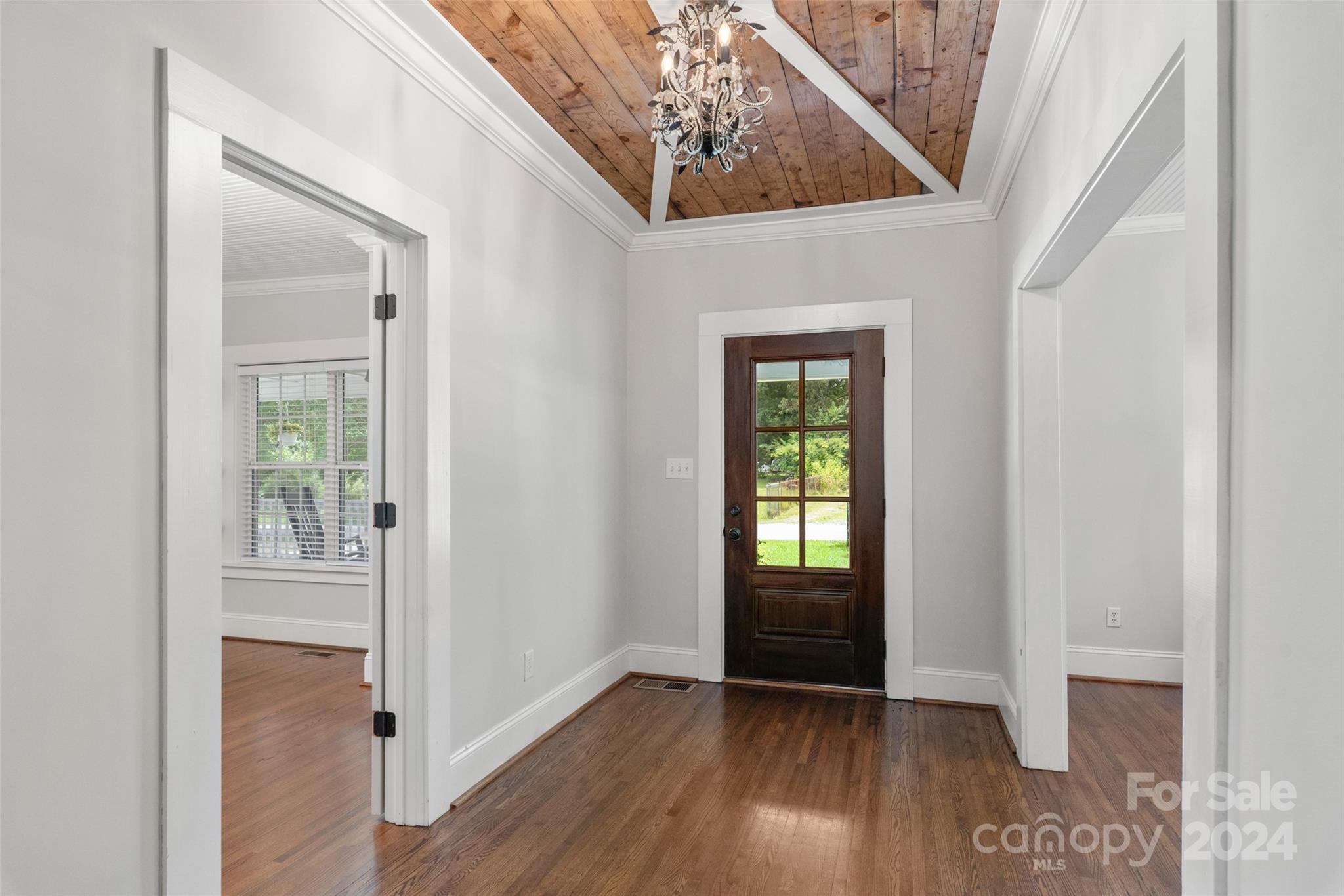 110 Park Road West Indian Trail, NC 28079 - Photo 6 of 41 wooden floor in an empty room with a window