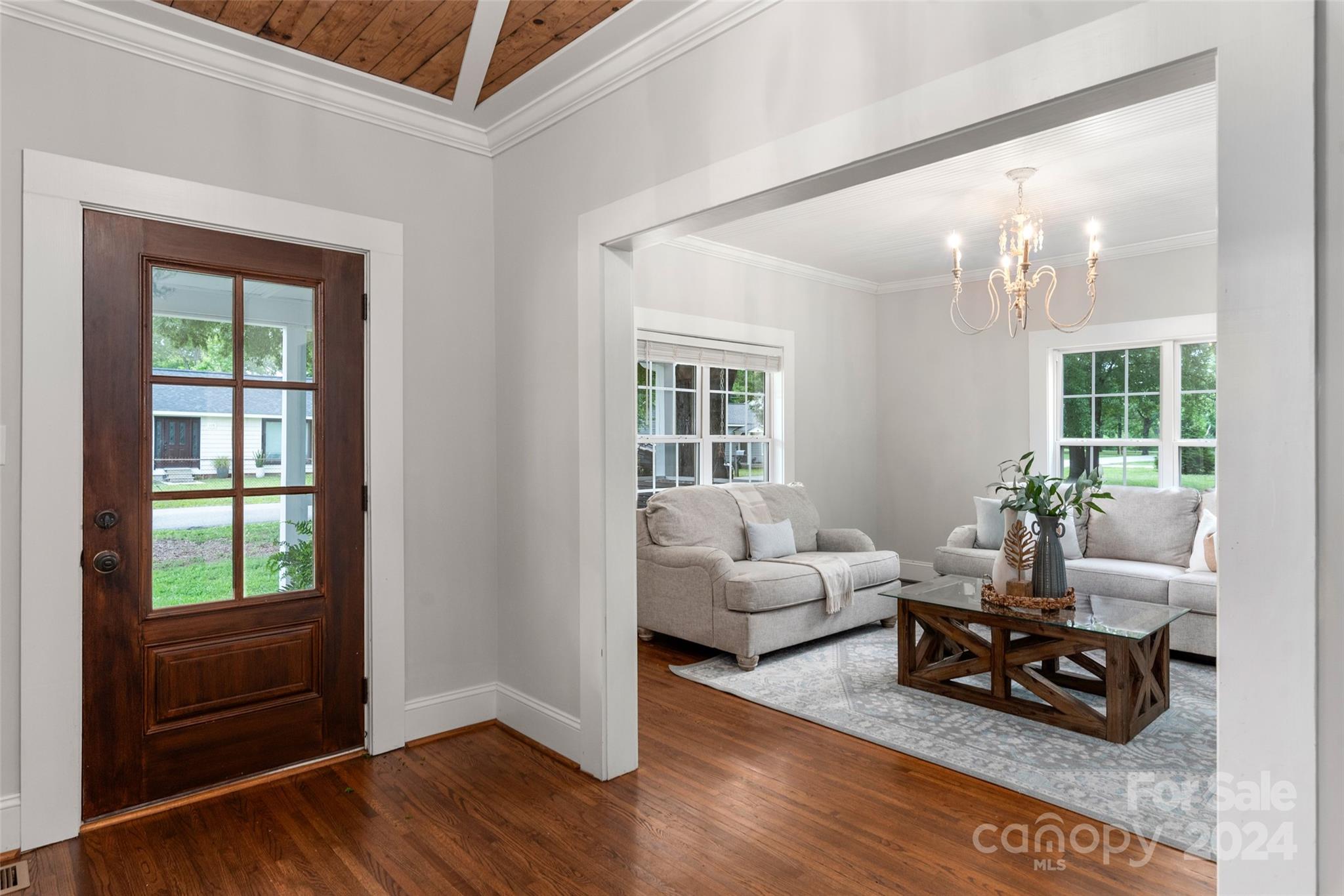 110 Park Road West Indian Trail, NC 28079 - Photo 7 of 41 a living room with furniture and wooden floor