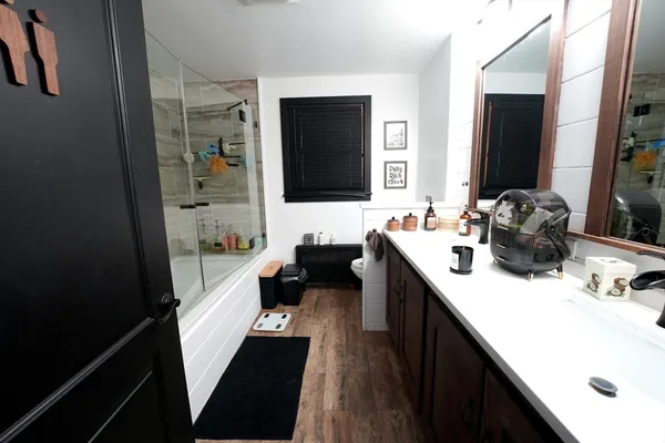 a kitchen with a sink stove and refrigerator
