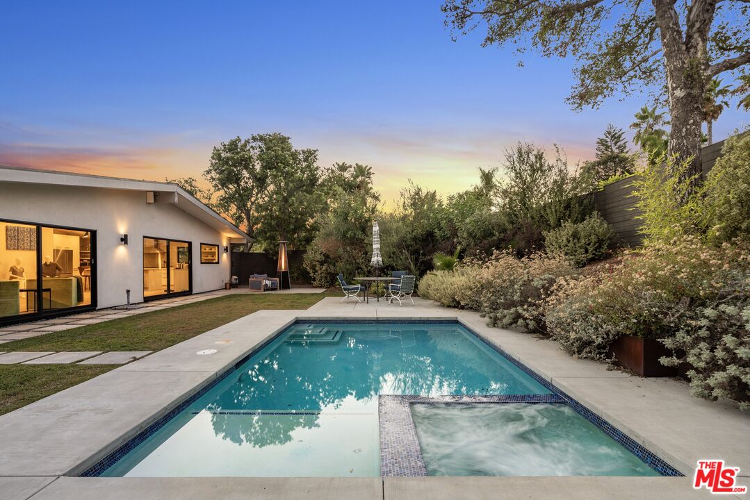 a view of a house with entertaining space