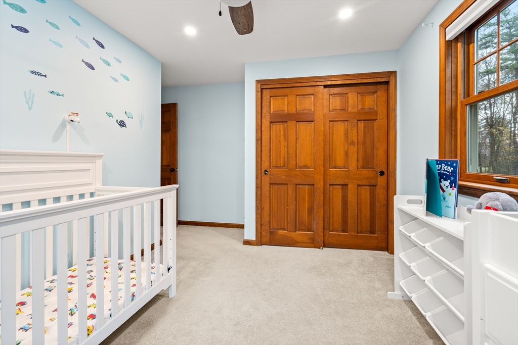 91 Century Way Dunstable, MA 01827 - Photo 23 of 31 a view of a bedroom with furniture and window