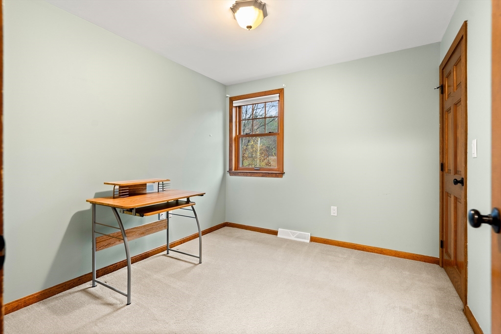 91 Century Way Dunstable, MA 01827 - Photo 24 of 31 a room with window and a table