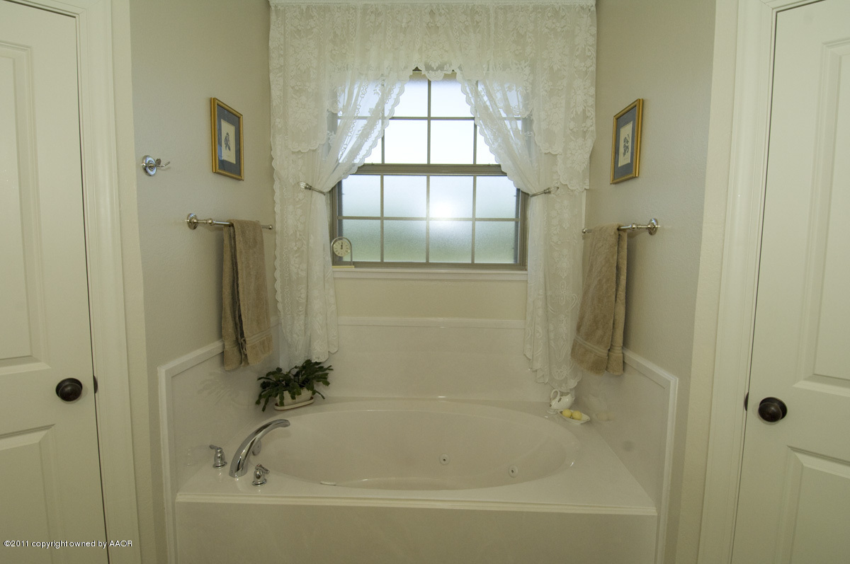 19251 Winding River Road Amarillo, TX 79119 - Photo 21 of 57 master bathroom
