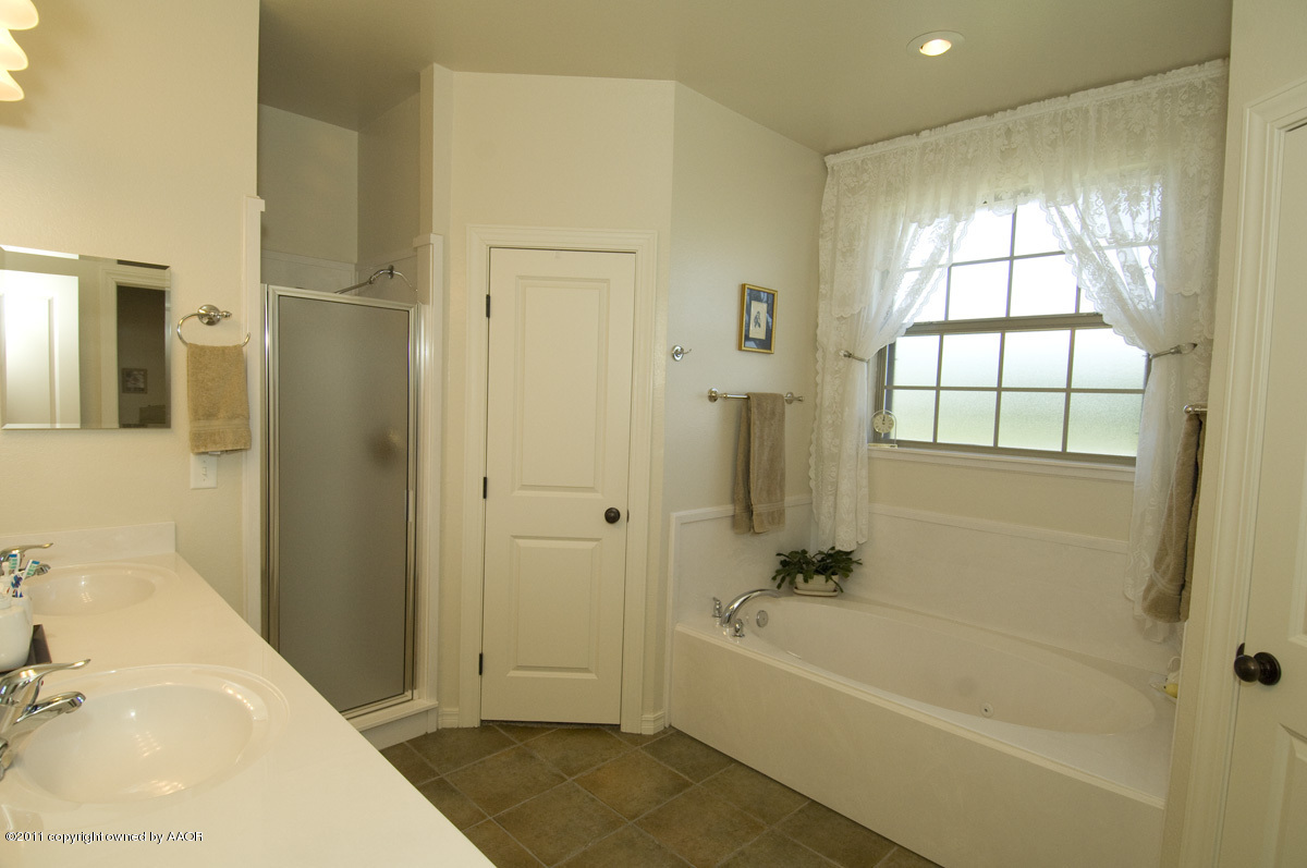 19251 Winding River Road Amarillo, TX 79119 - Photo 23 of 57 master bathroom