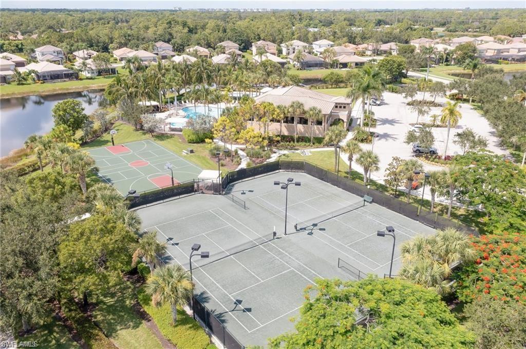 6899 Del Mar Terrace Naples, FL 34105 - Photo 11 of 41 an aerial view of residential houses with outdoor space