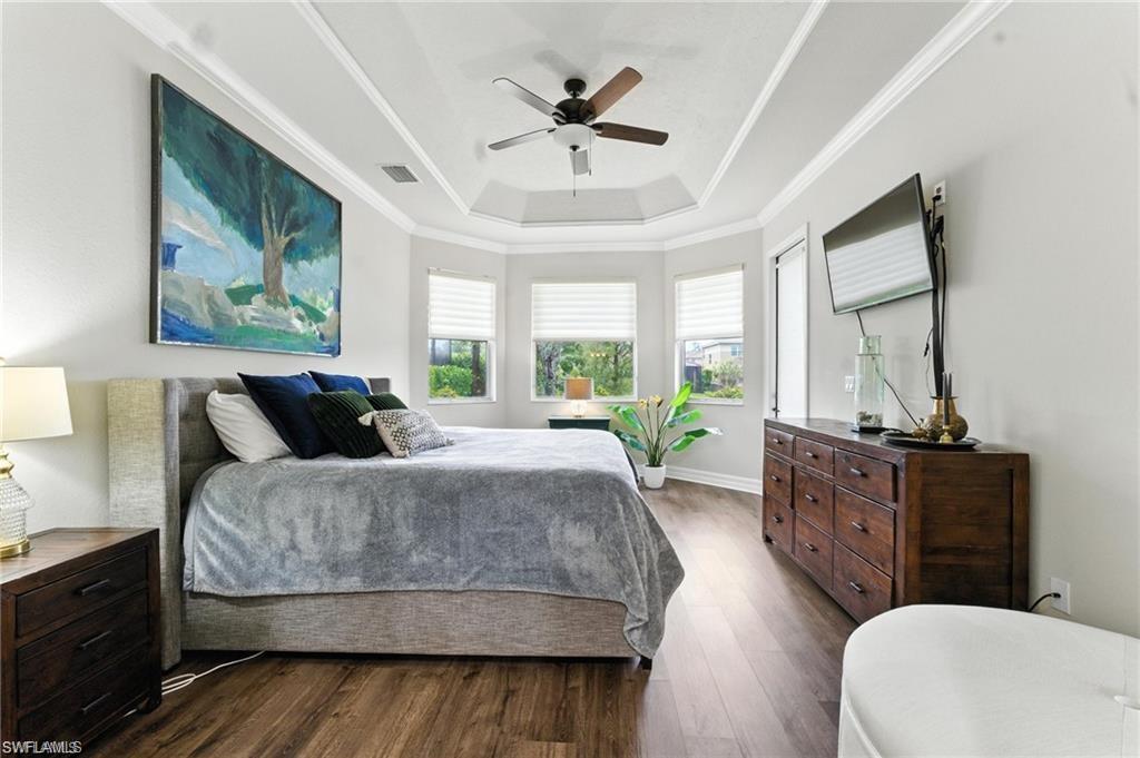6899 Del Mar Terrace Naples, FL 34105 - Photo 21 of 41 a living room with furniture and a large window