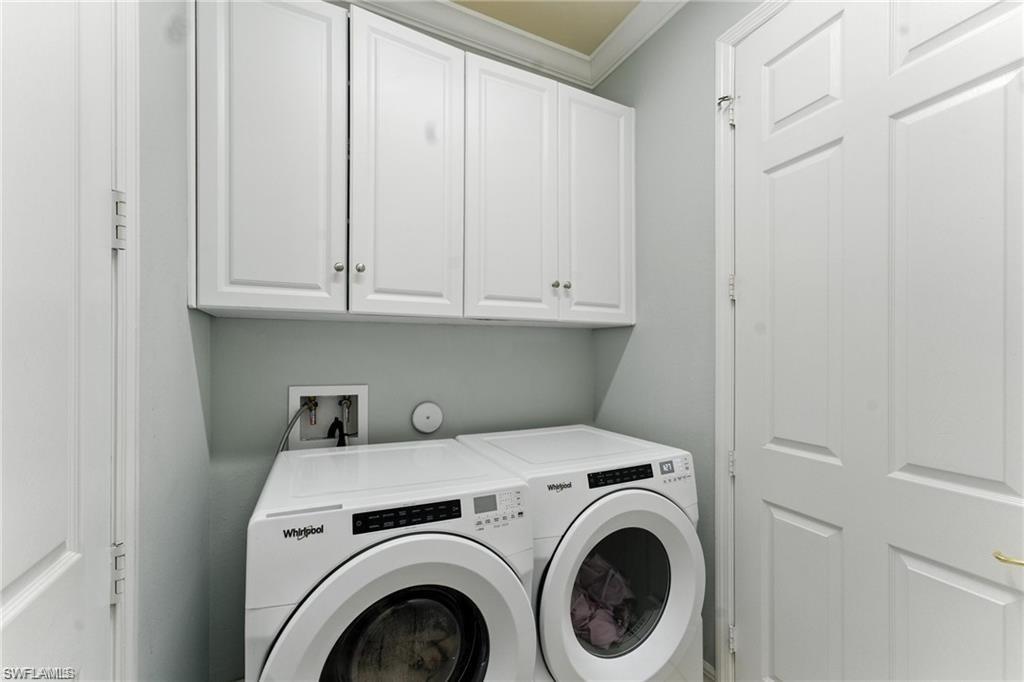 6899 Del Mar Terrace Naples, FL 34105 - Photo 31 of 41 a utility room with dryer and washer