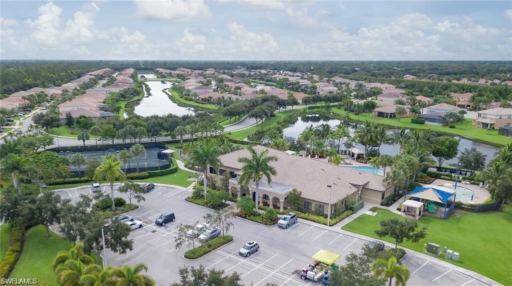 6899 Del Mar Terrace Naples, FL 34105 - Photo 40 of 41 an aerial view of a house with a garden and lake view