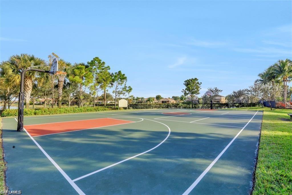 6899 Del Mar Terrace Naples, FL 34105 - Photo 6 of 41 a view of an outdoor space and tennis court