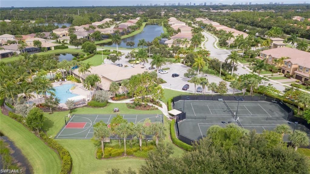 6899 Del Mar Terrace Naples, FL 34105 - Photo 7 of 41 an aerial view of residential houses with outdoor space