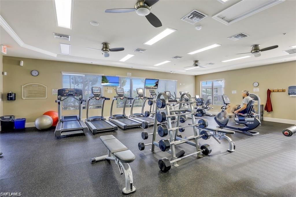 6899 Del Mar Terrace Naples, FL 34105 - Photo 8 of 41 a view of a room with gym equipment