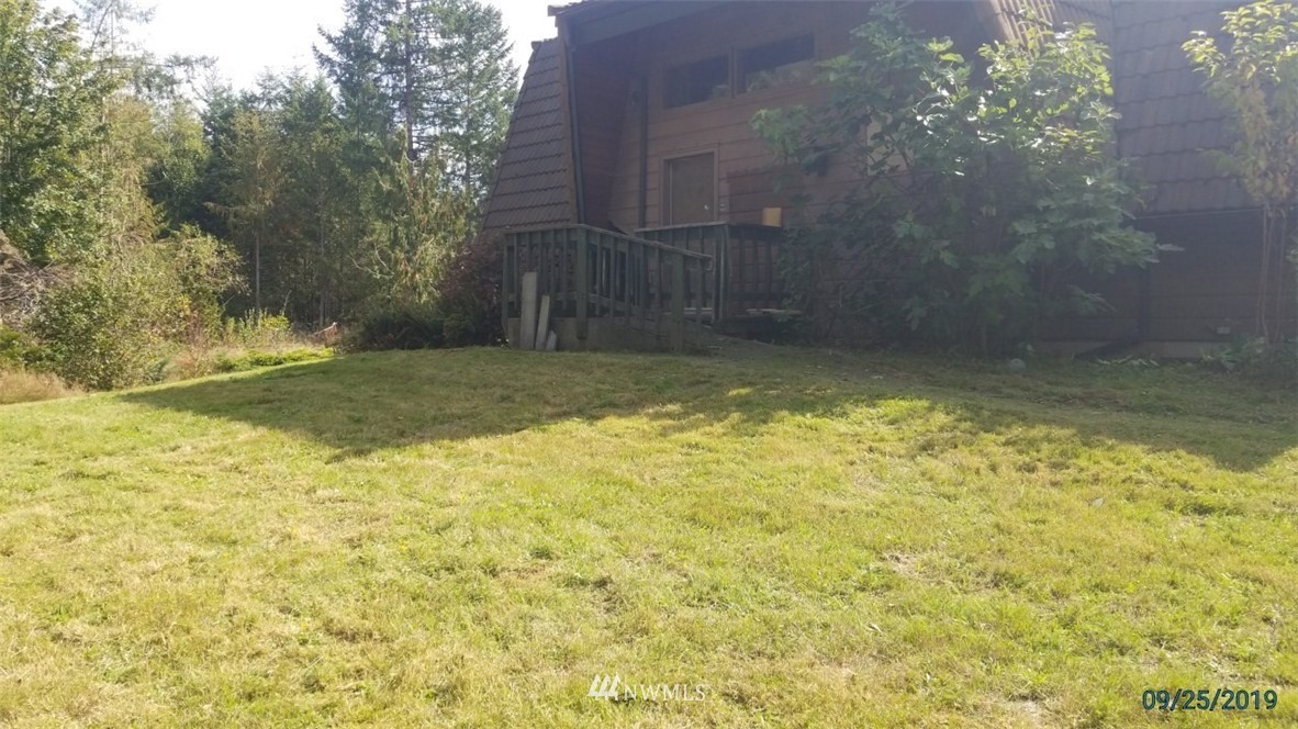 793 Rhoades Road Winlock, WA 98596 - Photo 1 of 24 a view of a yard