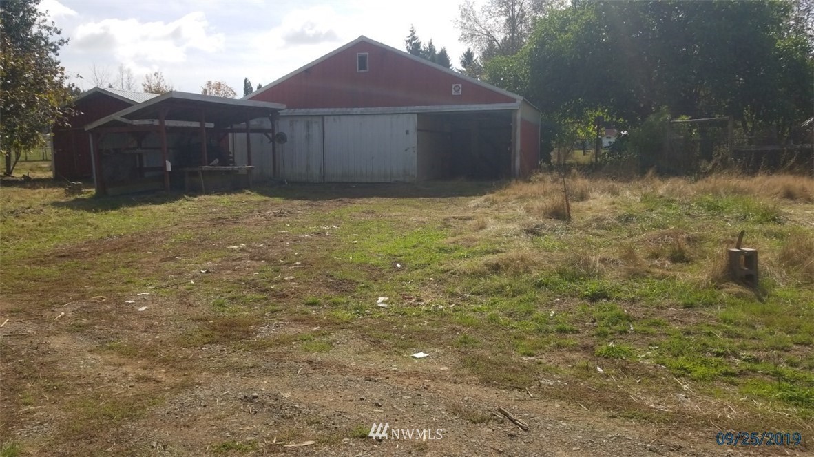 793 Rhoades Road Winlock, WA 98596 - Photo 2 of 24 a view of a yard