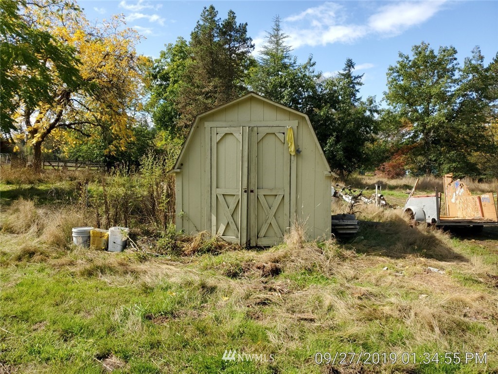 793 Rhoades Road Winlock, WA 98596 - Photo 11 of 24 a view of back yard of the house