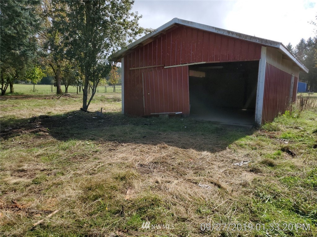 793 Rhoades Road Winlock, WA 98596 - Photo 9 of 24 a view of backyard of house with green space