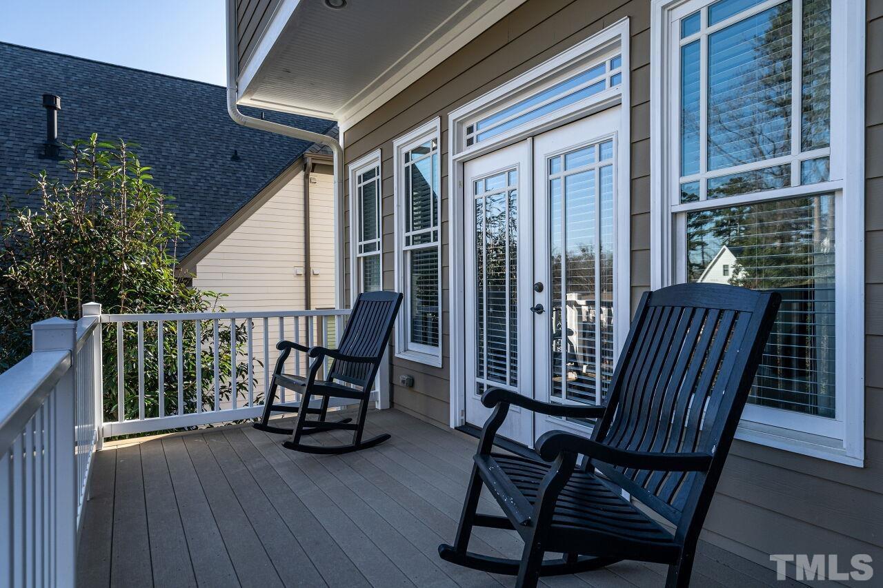 3024 Farrior Road Raleigh, NC 27607 - Photo 37 of 42 a view of balcony with furniture and wooden floor
