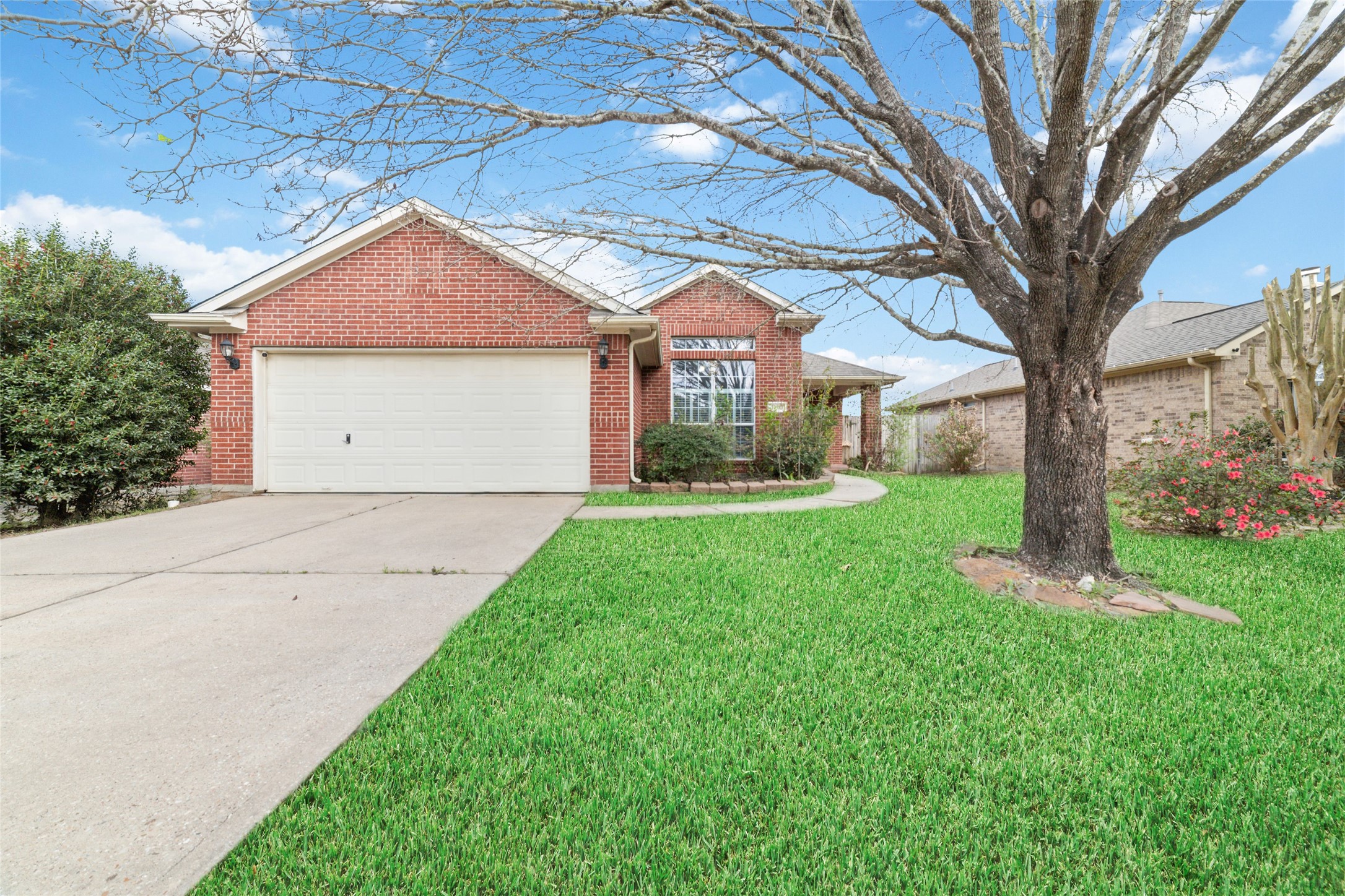 22911 Sebastian Drive Porter, TX 77365 - Photo 1 of 23 a front view of house with yard