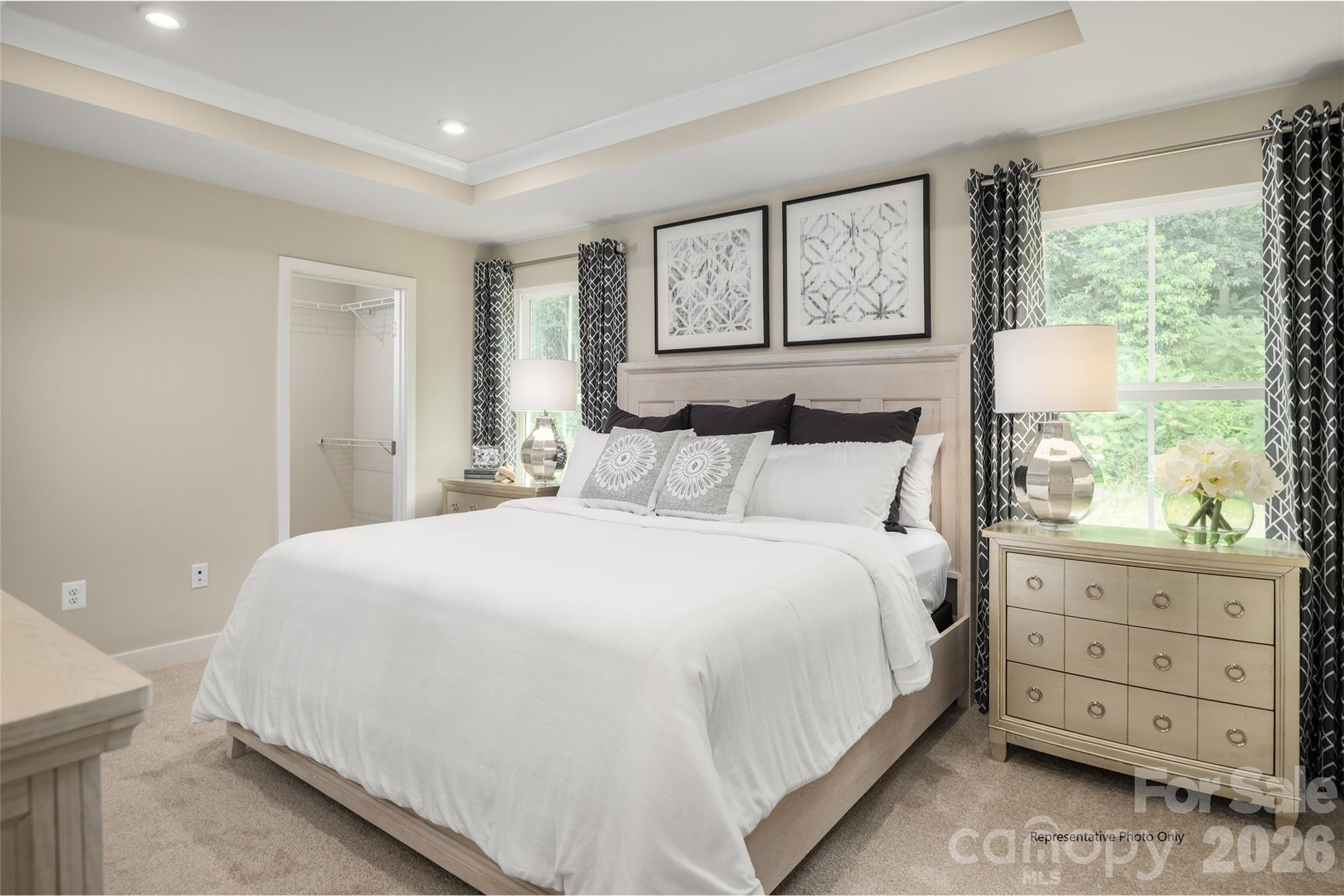 1020 Bracken Hill Road Indian Trail, NC 28079 - Photo 14 of 28 a bedroom with a large bed and a window