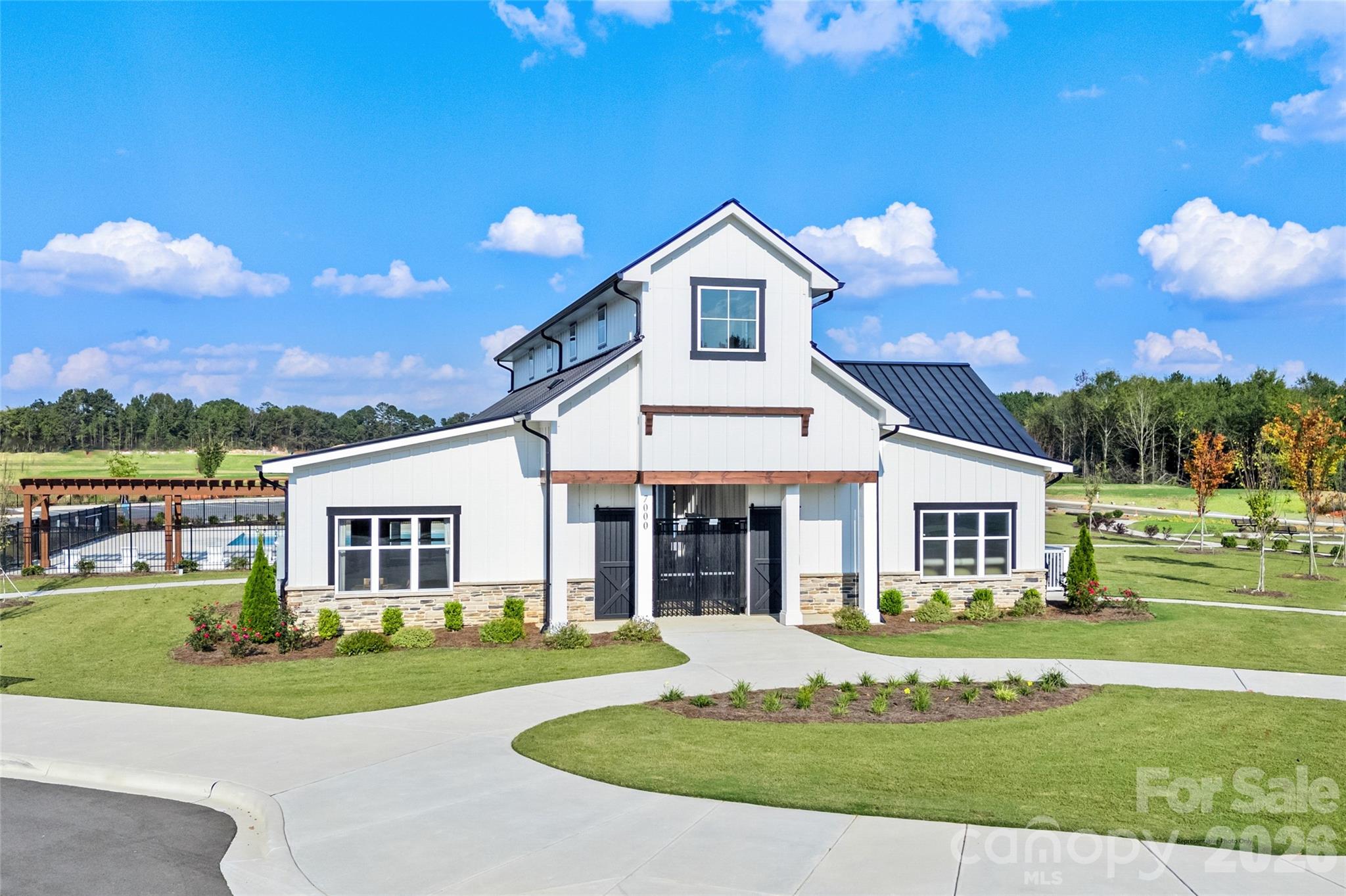 1020 Bracken Hill Road Indian Trail, NC 28079 - Photo 22 of 28 a front view of a house with a yard