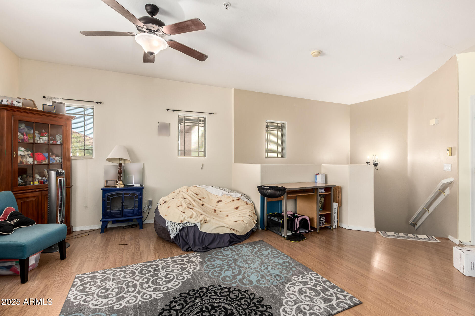 8117 West Groom Creek Road Phoenix, AZ 85043 - Photo 18 of 33 a bedroom with furniture and a mirror