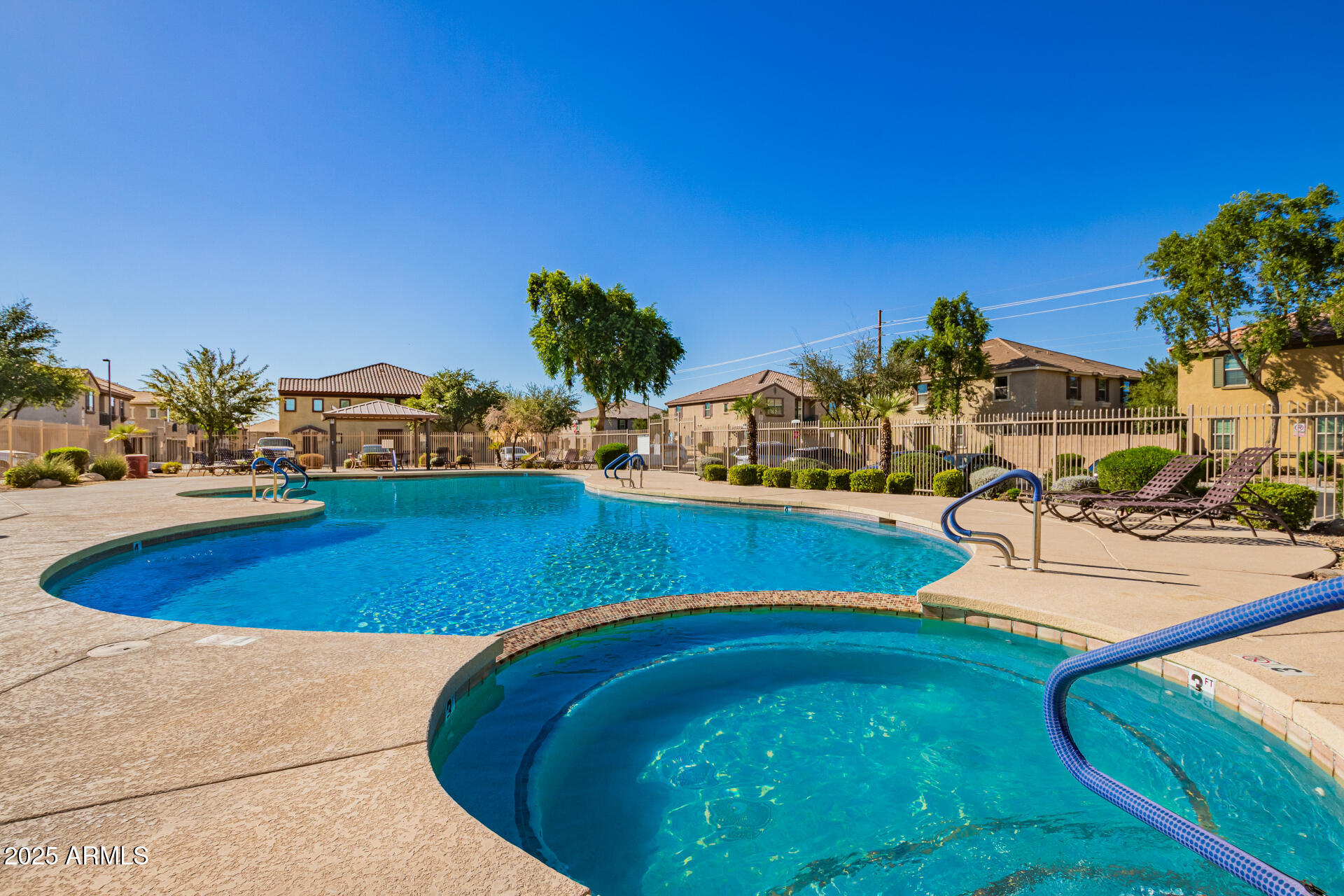 8117 West Groom Creek Road Phoenix, AZ 85043 - Photo 32 of 33 a view of a swimming pool with an outdoor seating and a yard