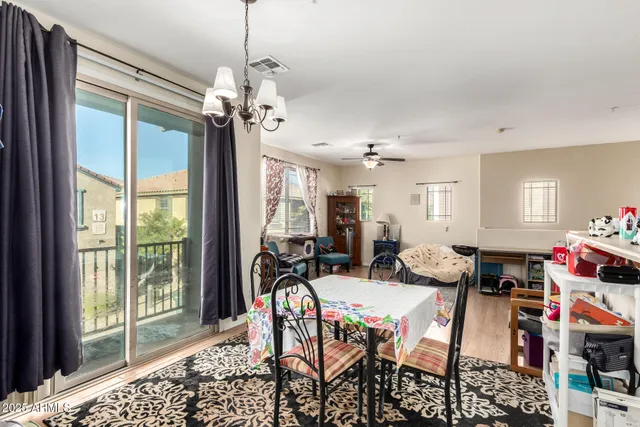 a view of a dining room with furniture window and outside view
