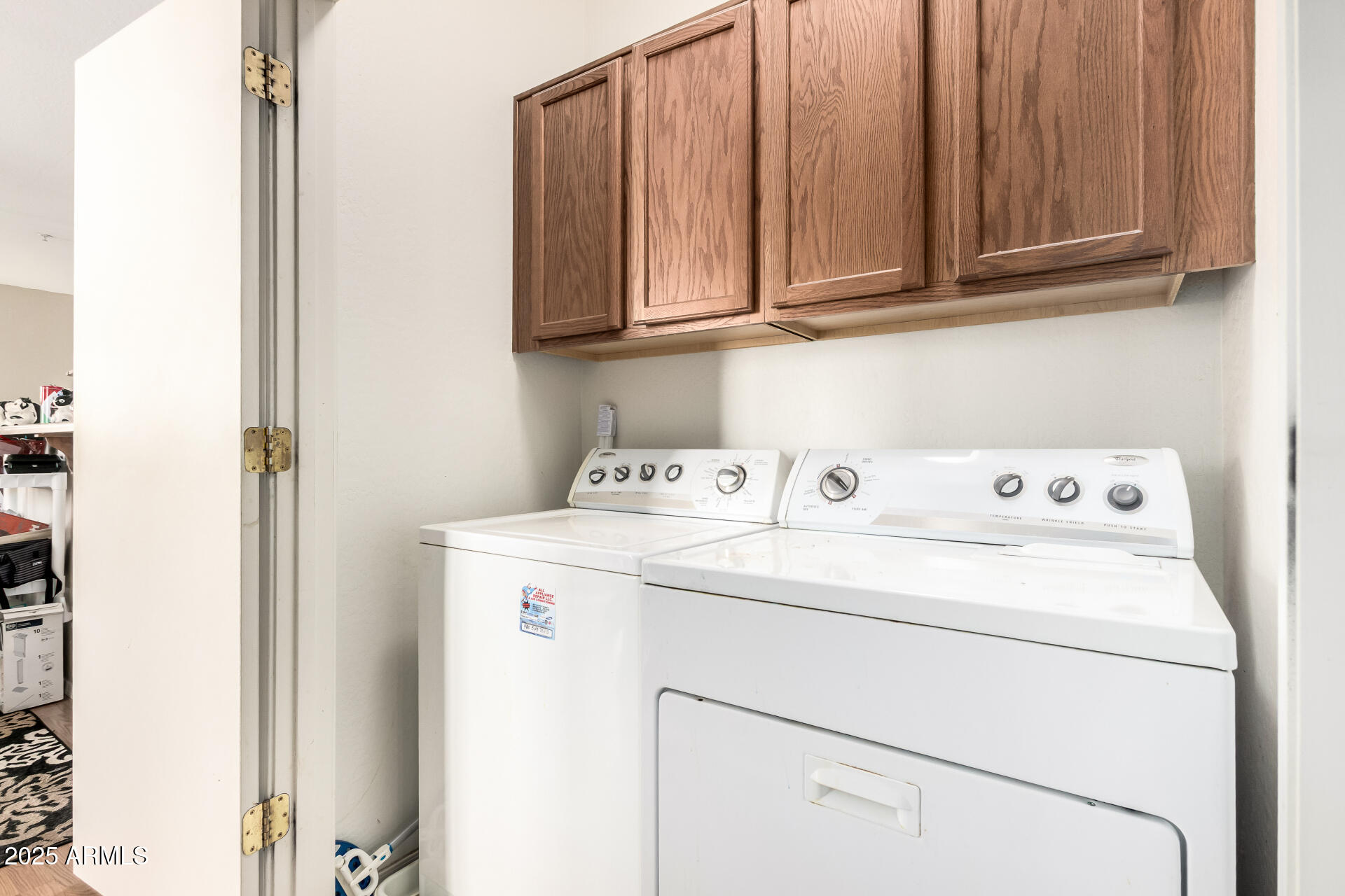 8117 West Groom Creek Road Phoenix, AZ 85043 - Photo 10 of 33 a utility room with dryer and washer